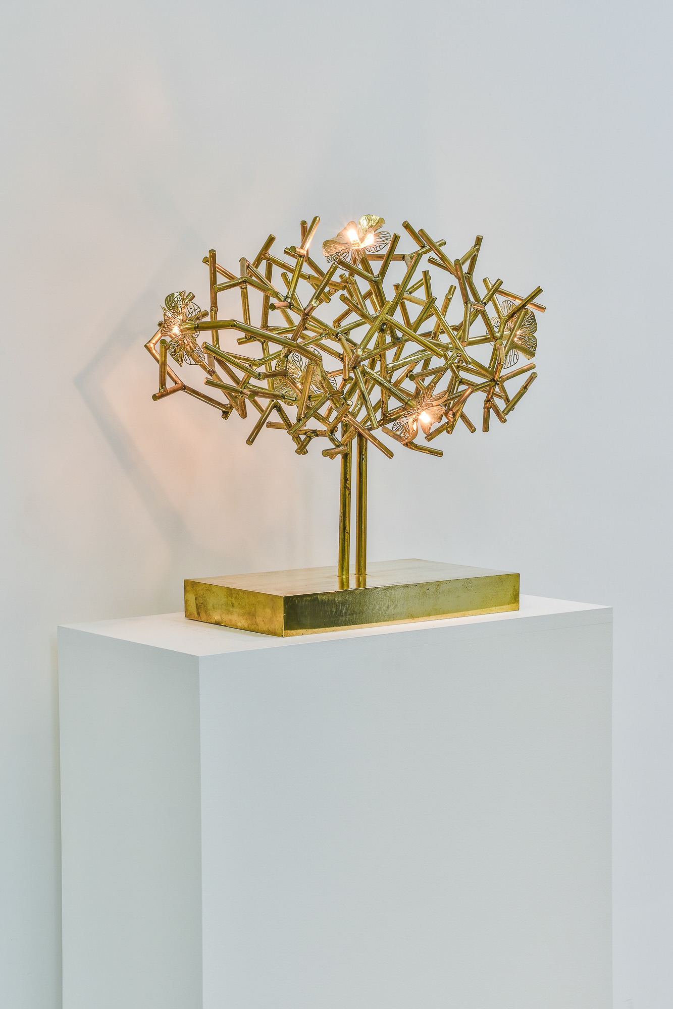 Indoor sculpture with lighting brass steel by annet van egmond