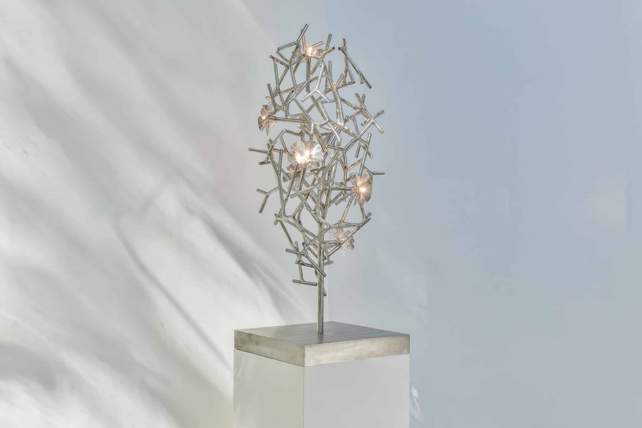 Indoor sculpture with lighting stainless steel by annet van egmond